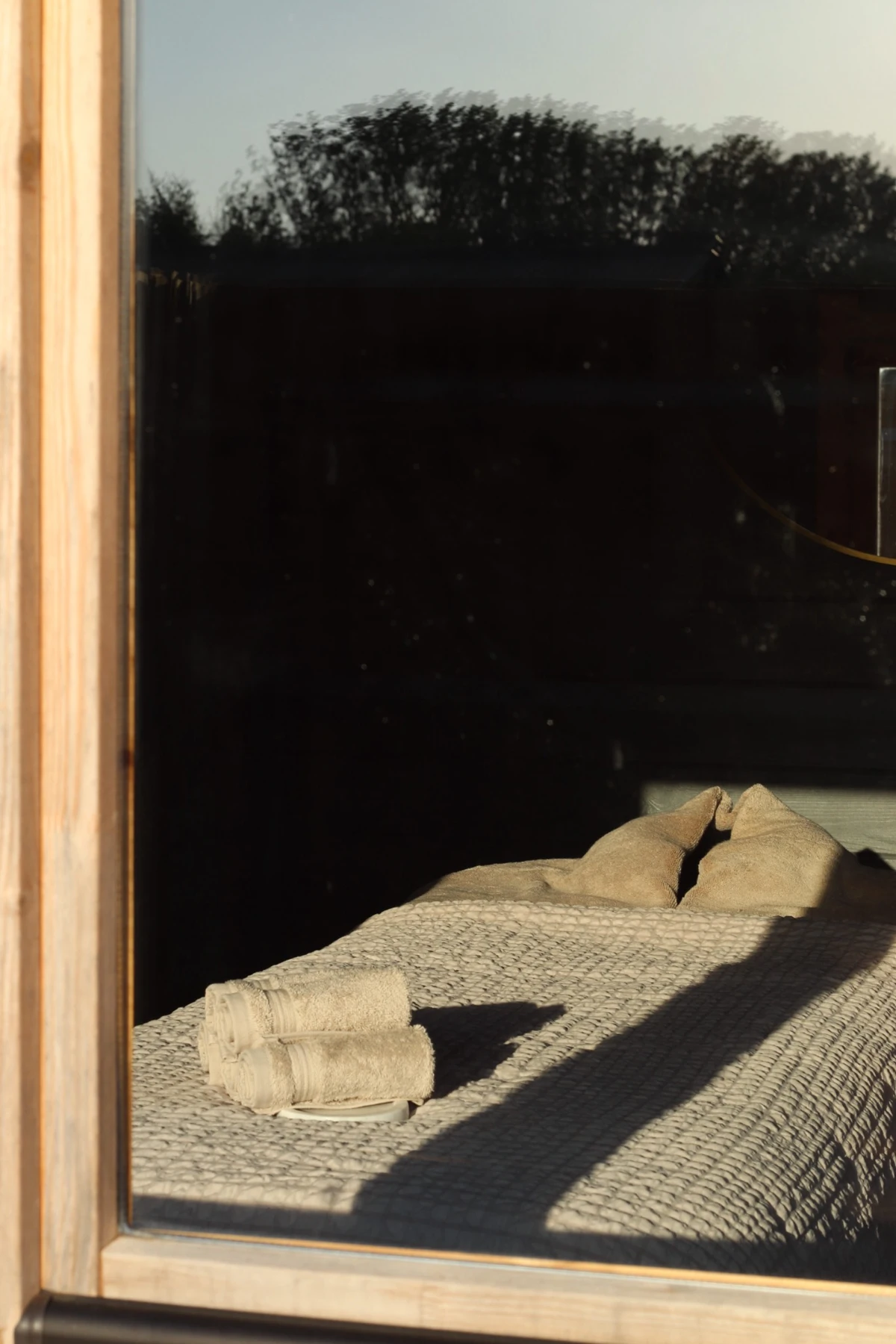 The treatment bed seen through the spa window